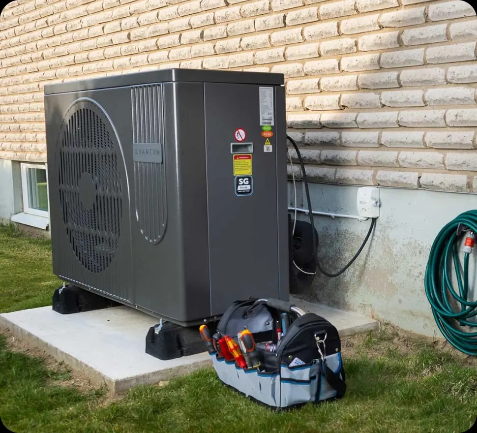 Air Source Heat Pump Being Serviced and Repaired